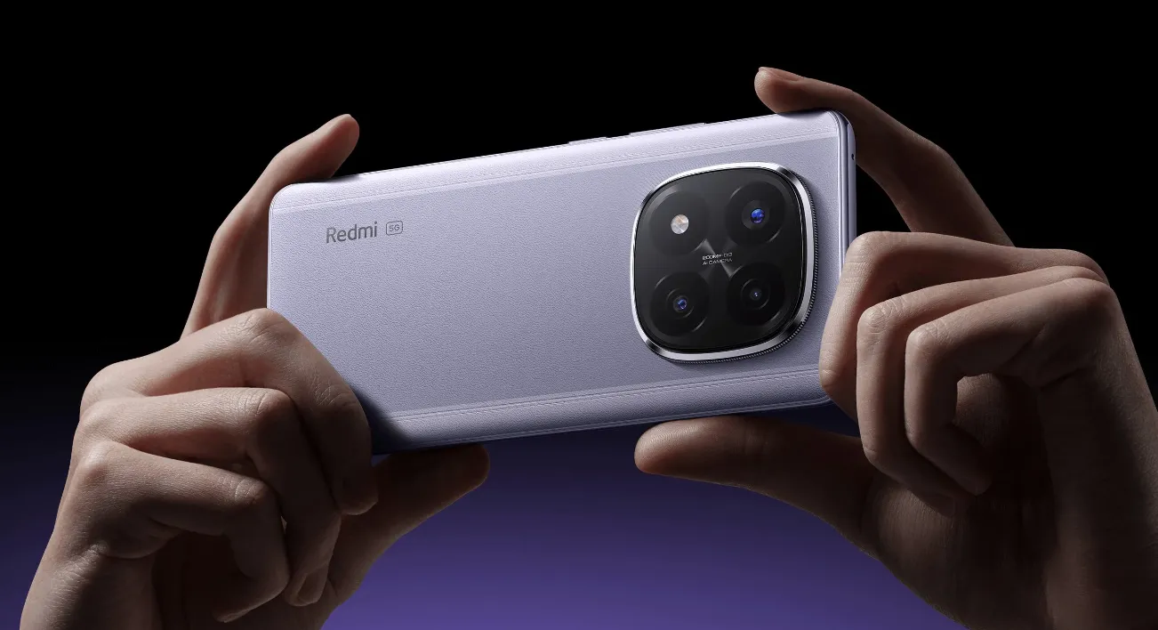Two hands holding a Redmi Note 14 Pro+ 5G in purple/lavender color horizontally, highlighting the large camera module, with the HyperOS 2.2 Global system.