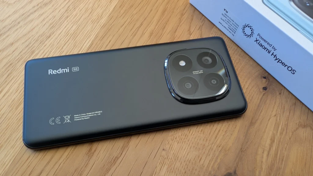 Redmi Note 14 Pro+ 5G with HyperOS 2.2 Global system, showing the back of the phone and the product box.