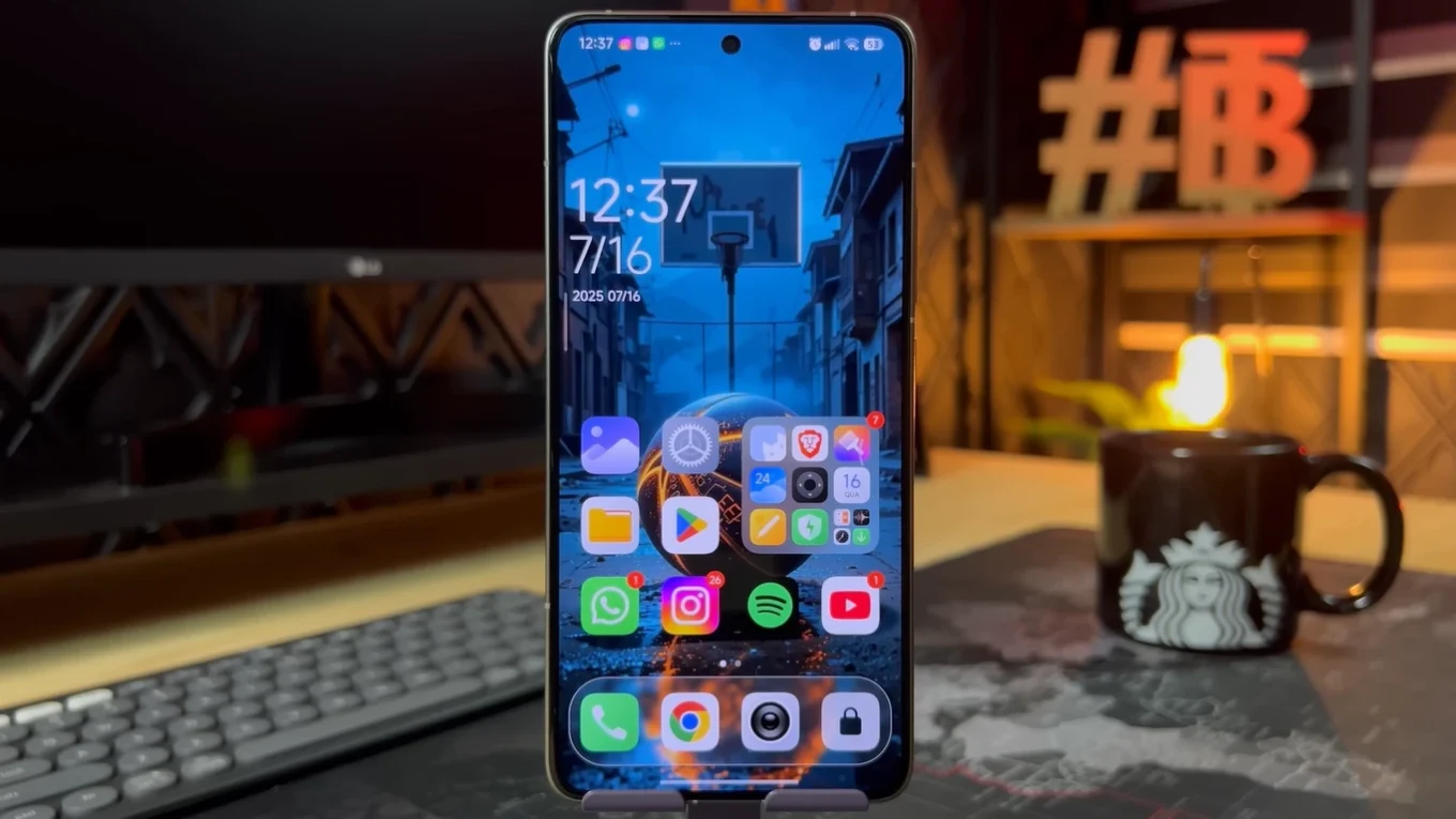 Xiaomi smartphone displaying the HyperOS 2.2 home screen with a basketball wallpaper and popular app icons.