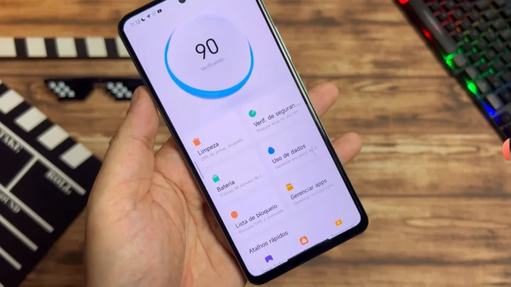 Smartphone with HyperOS 2.2 interface displaying the security menu, which includes cleaning, battery usage and application management options.