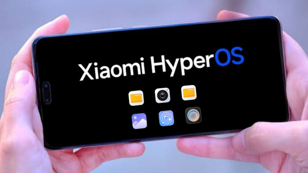Hands holding a Xiaomi smartphone with the screen displaying "Xiaomi HyperOS" and several app icons, representing the New Apps in HyperOS 3.