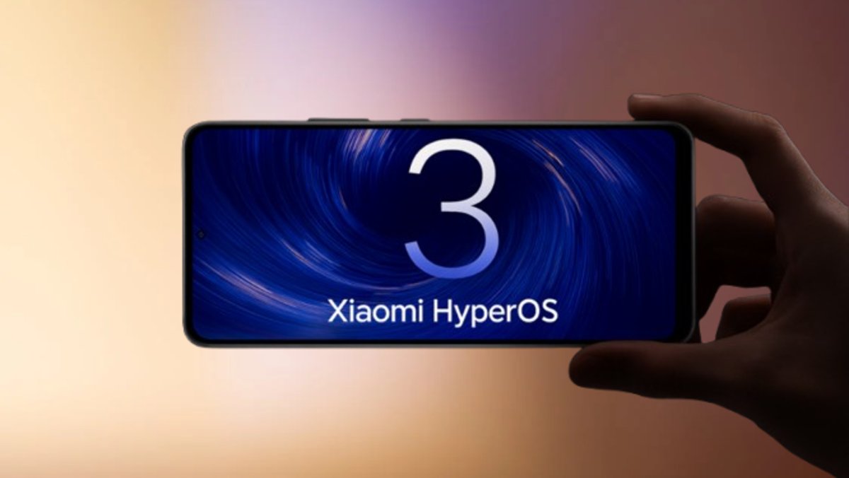 Hand holding a smartphone with the screen displaying "HyperOS 3 Global" and "Xiaomi HyperOS" against a warm-toned background.