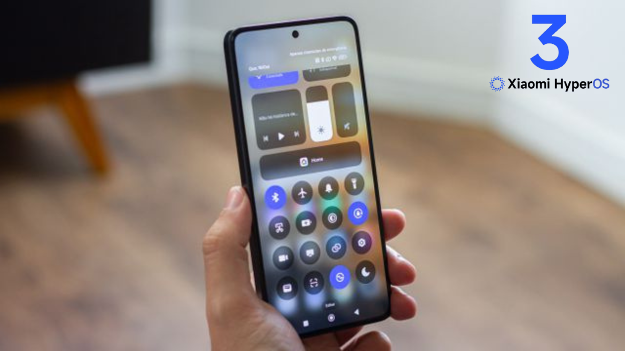 A person holding a Xiaomi smartphone displaying the new control center interface of the HyperOS 3 Global update with Android 16 features.